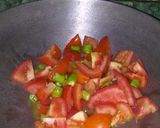 A picture of step 2 of Tomato green chilli veg.