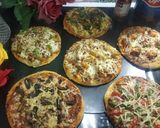 A picture of step 10 of Domino's style pasta pizza.
