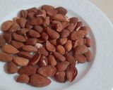 Foto del passaggio 1 della ricetta Biscotti natalizi con mandorle, cacao, miele e cannella