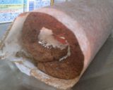 A picture of step 12 of Fluffy Chocolate Roll Cake.