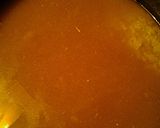 A picture of step 5 of Annatto chicken and rice stoup.