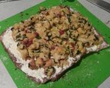A picture of step 10 of Creamy Spinach Artichoke Pork Roulade.