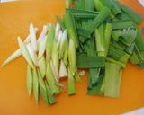 A picture of step 1 of Garlic Scapes and Pork Belly Fried in Oyster Sauce.