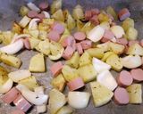 A picture of step 4 of Hot dog, potato and onion roast.