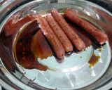 A picture of step 2 of Preserved Duck Meat And Chinese Sausage Fried Rice.