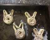 A picture of step 4 of Easter bunny cinnamon rolls.