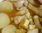 A picture of step 9 of Simmered Chicken Drumettes, Daikon, and Atsuage Tofu.