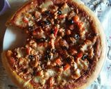 A picture of step 4 of Chicken tikka pizza.