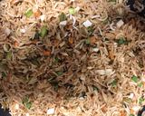 A picture of step 6 of Fried rice-a chinese dish served with manchurian.