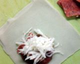 A picture of step 1 of Wonton Pizza Rolls.