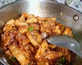 A picture of step 8 of Honey chilli potatoes.