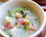 A picture of step 8 of Miso Milk Soup with Maitake Mushrooms, Satoimo (Taro Root), and Pea Shoots.