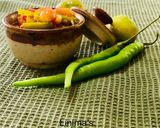 A picture of step 2 of Karonda pickle.