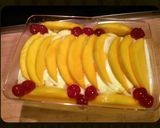A picture of step 4 of AMIEs MANGO Tiramisu CAKE.
