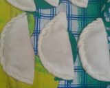 A picture of step 4 of Suji ke ladu with tea.