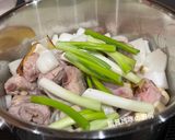 A picture of step 8 of Korean-Style Potato and Pork Rib Soup.