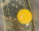 A picture of step 1 of Tortilla and egg sausage wrap.