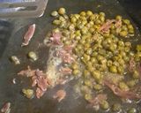 A picture of step 10 of Pan fried seabass fillets on a bed of citrus broccoli.