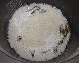 A picture of step 2 of Coconut Rice With Curry Leaves.
