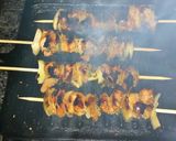A picture of step 8 of Onion & Orange kabobs.