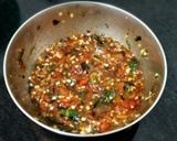 A picture of step 2 of Bhut jalokia naga chives chutney🔥.