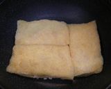 A picture of step 6 of Simmered Aburaage Filled with Ground Chicken and Tofu.