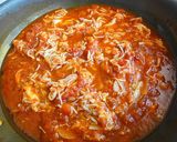 A picture of step 2 of Tomato Pasta with King Crab.