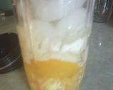 A picture of step 1 of Sun Shines Orange Peach Smoothie.