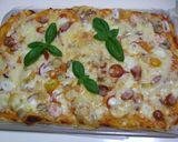 A picture of step 7 of Our Family's Easy Recipe For Pizza To Serve To Guests.