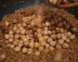 A picture of step 8 of Chole masala or chickpeas masala.