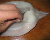 A picture of step 4 of Fresh Squid Naruto-Style Rolls.