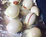 A picture of step 3 of Stuffed Onion Bombs.