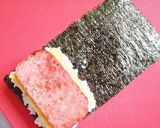 A picture of step 4 of Pork and Egg Onigiri (Okinawan-Style Spam Musubi).