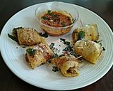 A picture of step 8 of Eggplant Pizza Roll Ups.