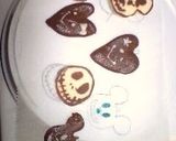 A picture of step 9 of Kabocha Squash Custard Puddings Decorated with Chocolate Characters for Halloween.