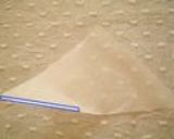A picture of step 5 of Petite Chocolate Piping Cone.