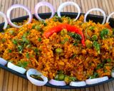 A picture of step 5 of Gobhi Matar Keema.