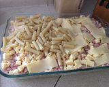 Foto del paso 4 de la receta: Mostaccioli gratinados con queso, jamón y cebolla caramelizada