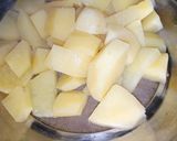 A picture of step 13 of Khatay aloo.