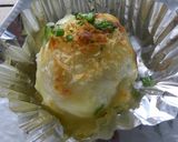 A picture of step 7 of Piping Hot Taro Root Baked in Cheese.