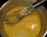 A picture of step 13 of Classic NOLA Bread Pudding with Bourbon Sauce.