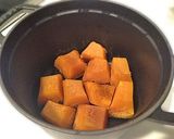 A picture of step 8 of Simmered Kabocha Squash in a Staub Cocotte.