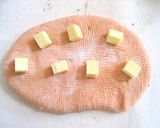 A picture of step 2 of Tomato & Cheese Bagels.