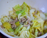 A picture of step 5 of Simmered Spring Cabbage and Spring Onions with Mustard Cream.