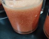 A picture of step 3 of Pomegranate orange juice.