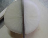 A picture of step 7 of Prep Daikon Radish for Buri Daikon and Simmered Dishes.
