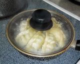 A picture of step 2 of How to successfully pan-fry frozen dumplings.