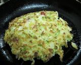 A picture of step 7 of Okonomiyaki with Lots of Cabbage.