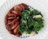 A picture of step 6 of Spotted Trotter Chicken Currywurst Stewed in a Madras Curry Sauce with Russet Potatoes and Kale.