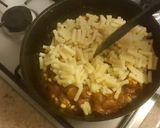 A picture of step 8 of Sausage corn macaroni pasta.